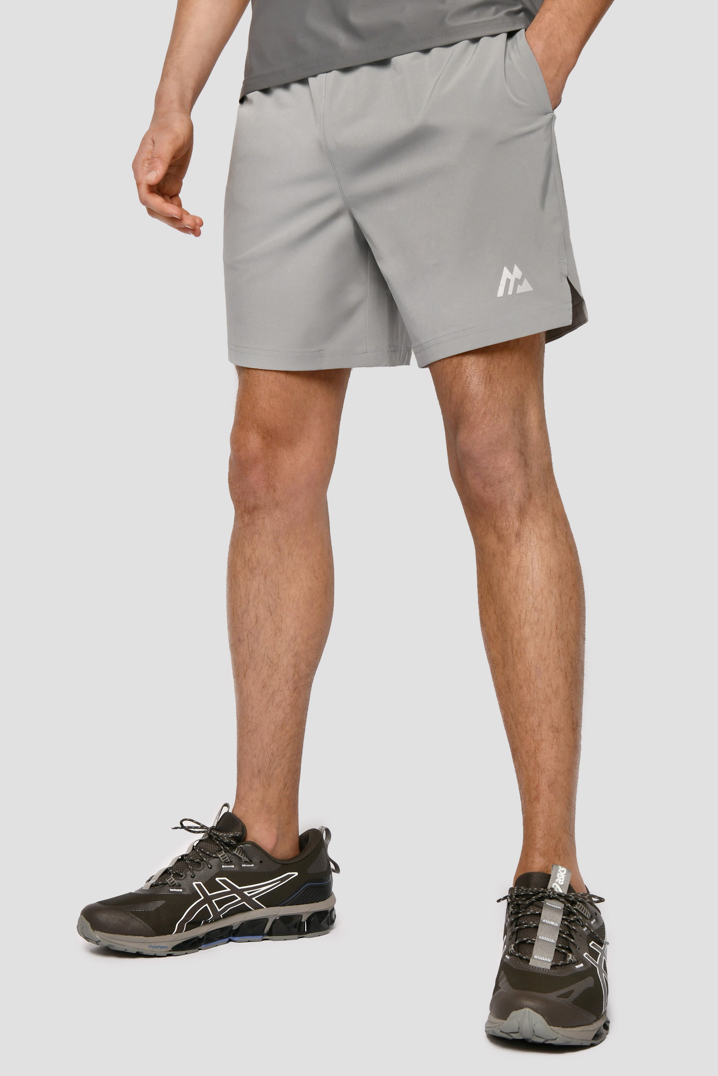 Asics essentials 7 sales inch woven running shorts