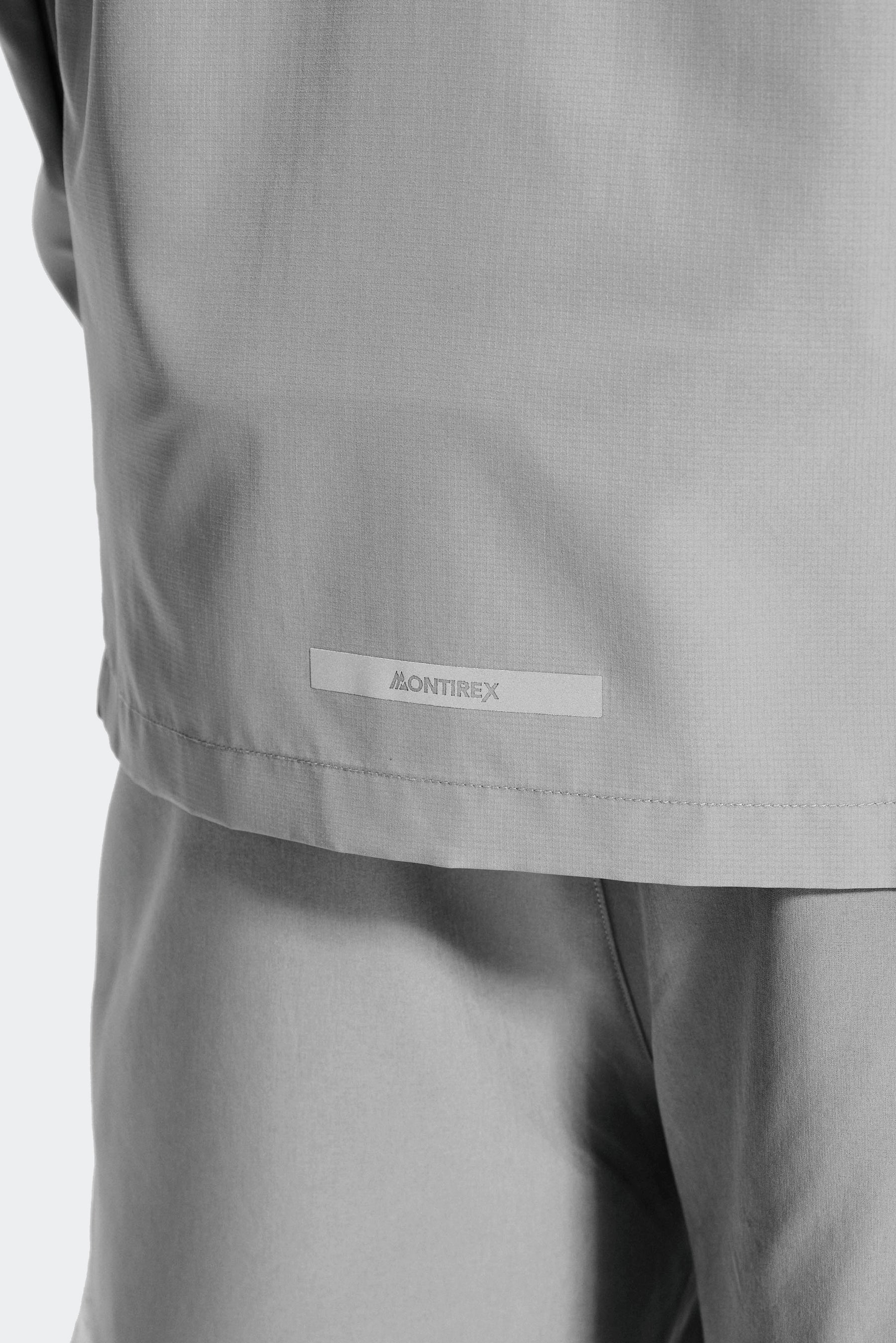 Trail Windbreaker - Grey/Pink