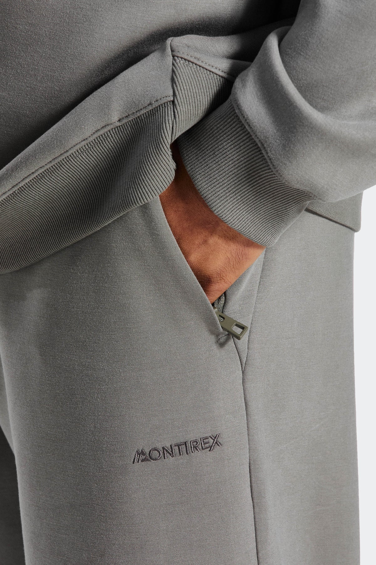 Alpex Wide Leg Jogger - Weathered Stone — Zipped side pockets.