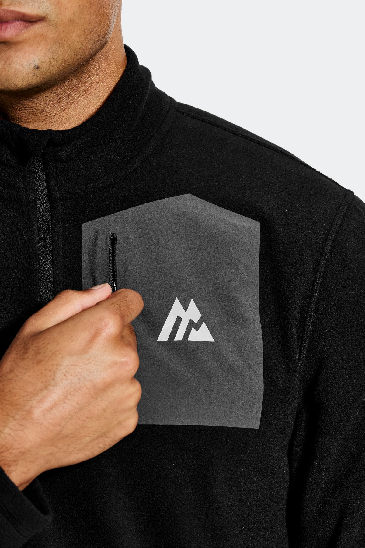 Baltic Fleece - Black/Asphalt: contrast chest pocket with zip.