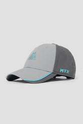 Gray cap with teal accents and branding on a light gray background