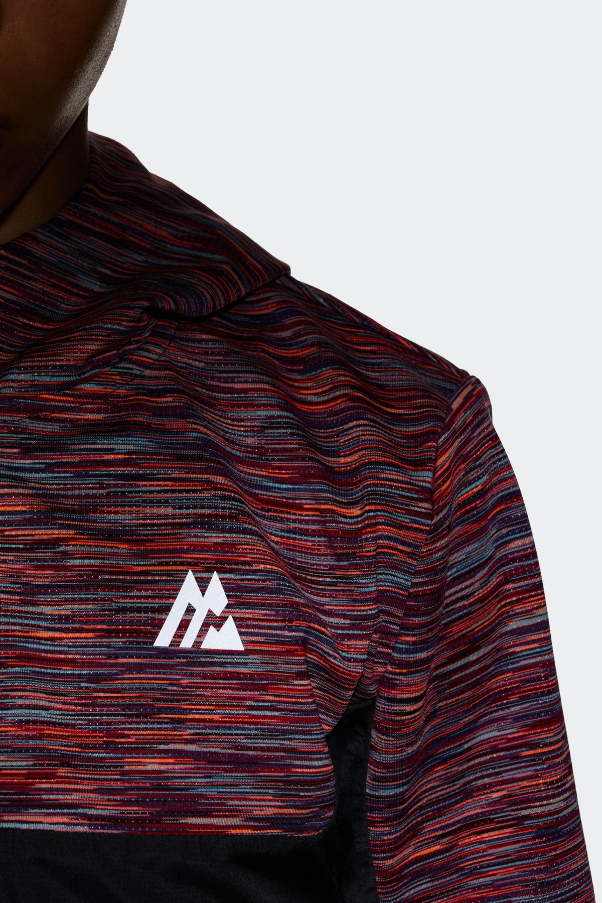 Reflective chest branding.