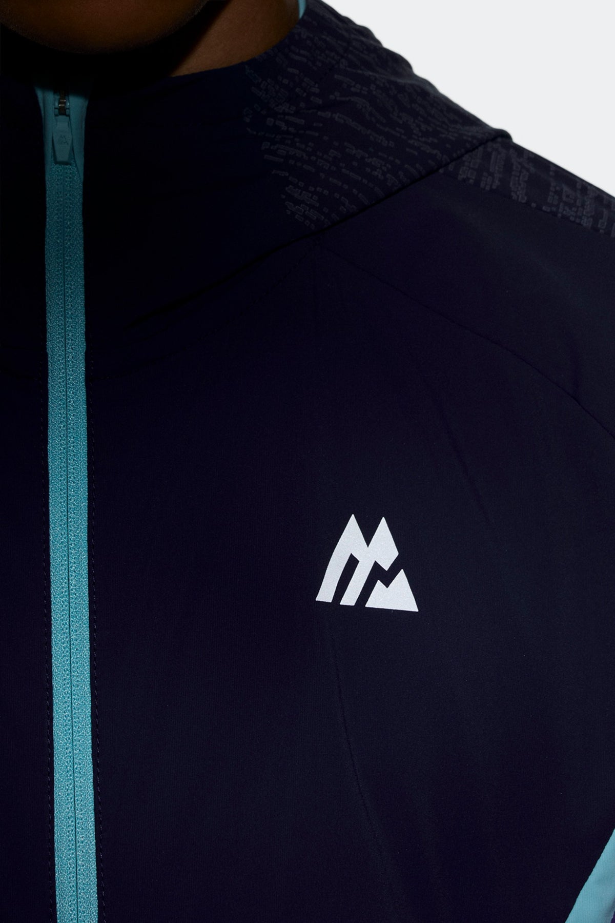 Reflective detailing and logo for improved visibility.