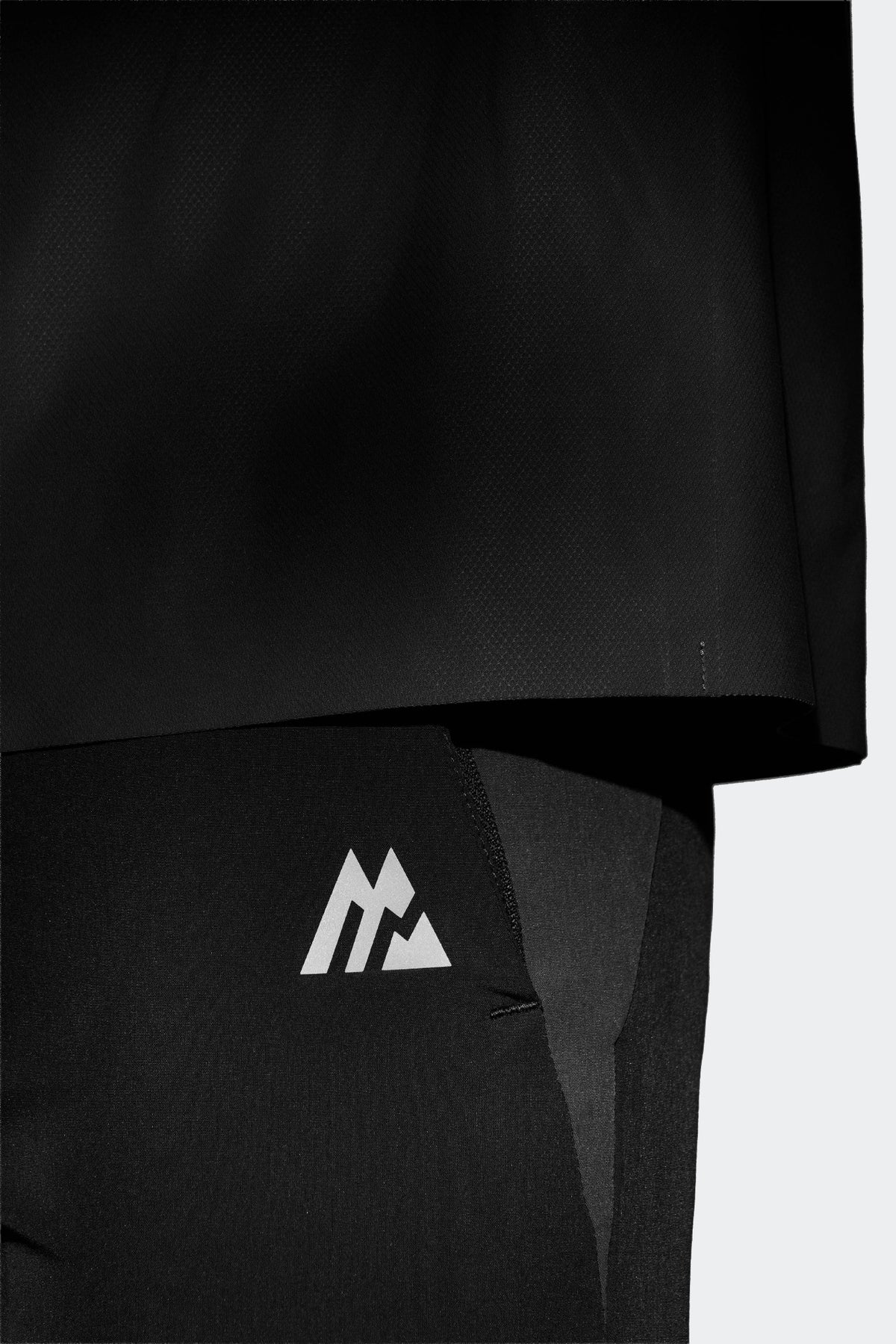 Reflective branding for improved visibility.