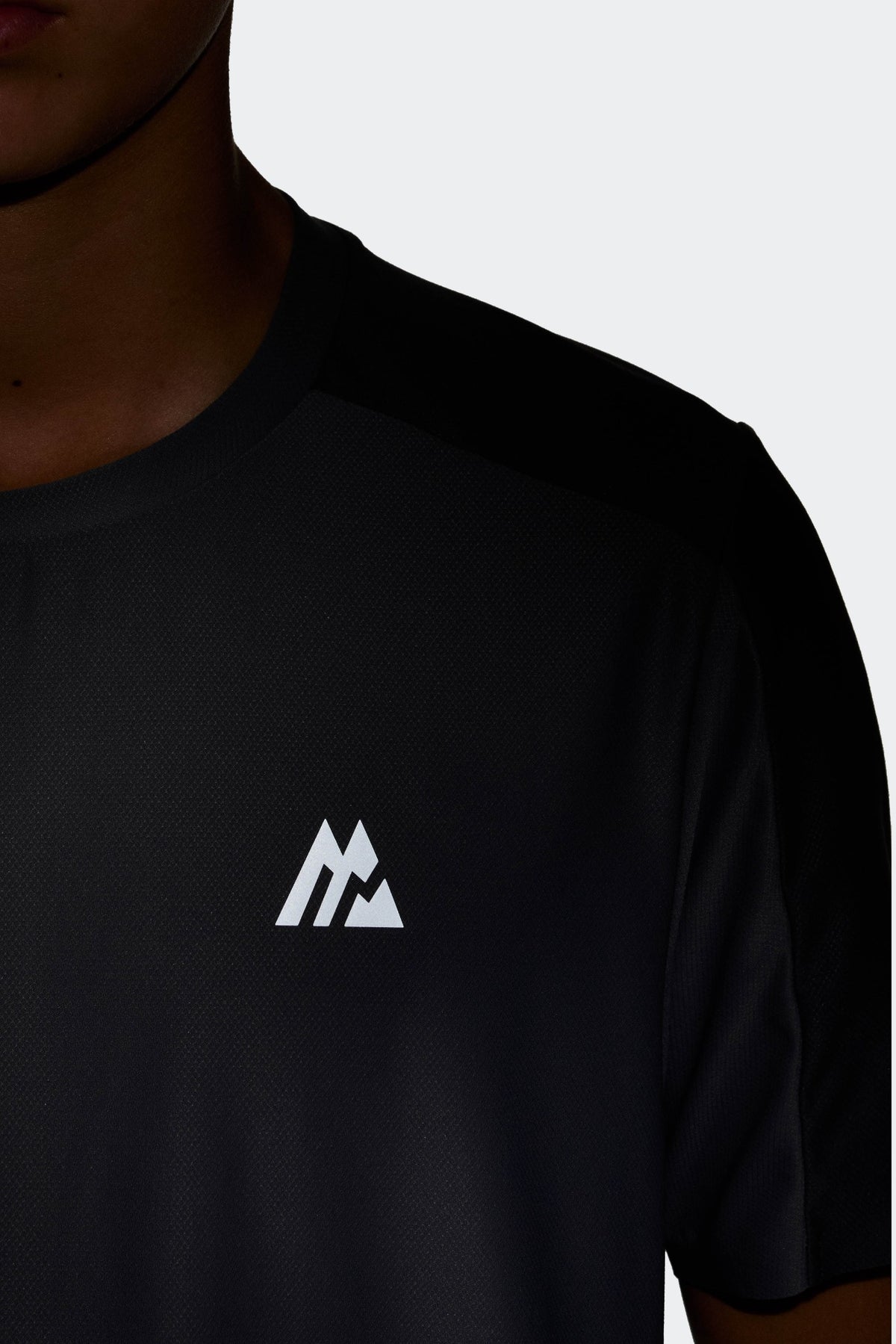 Reflective branding for improved visibility.
