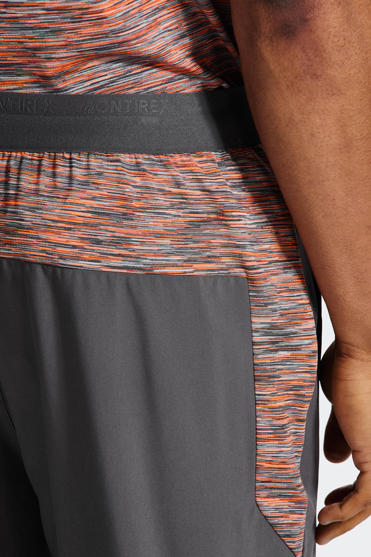 Trail Panel Running Pant - Grey/Orange — Back panel with Trail print for a stylish finish.