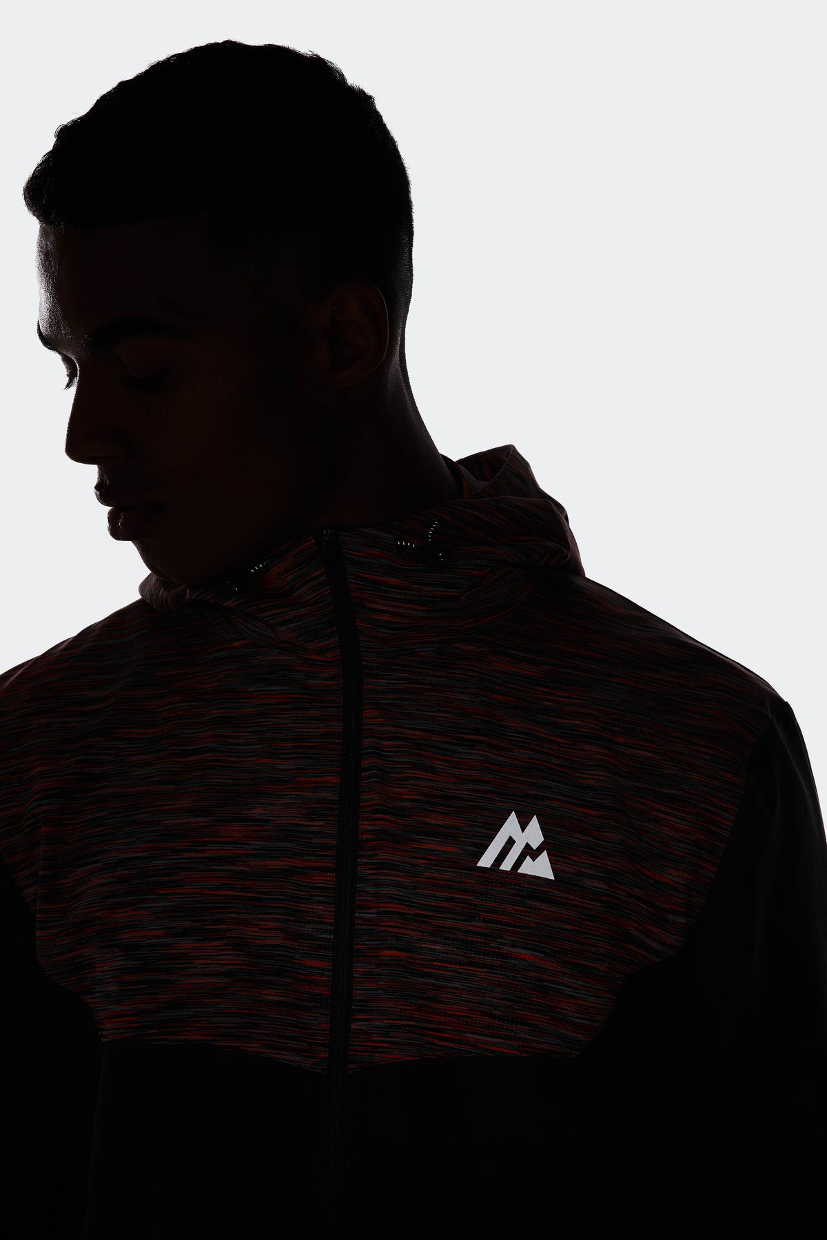 Trail 3.0 Windbreaker - Grey/Orange — Reflective detailing for low-light visibility.