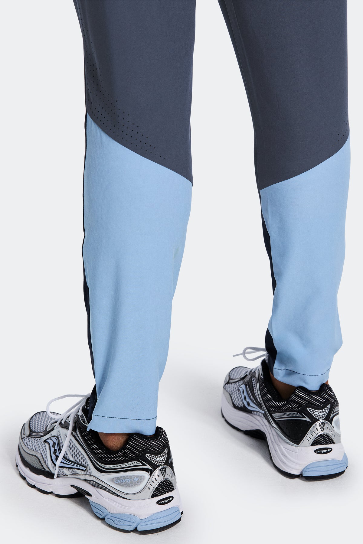 Trion Pant - Navy Abyss/Graphite/Blue Tide — Laser print vents for improved breathability.