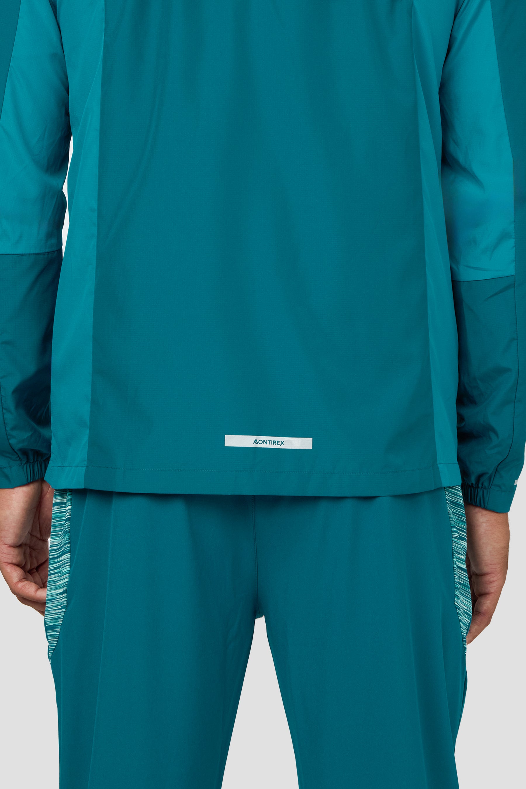 Trail Windbreaker - Teal Multi