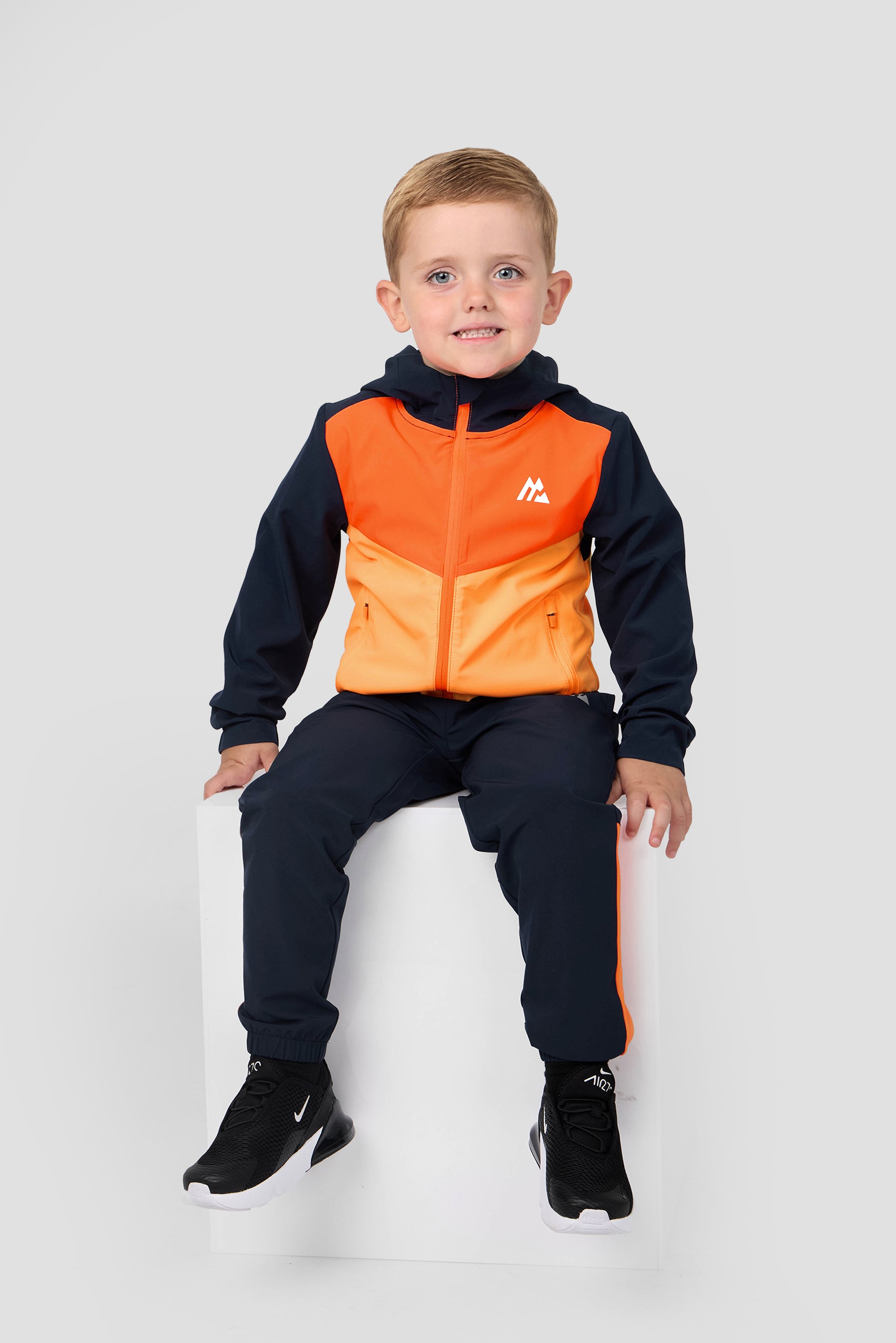Velocity WIndbreaker - Midnight Blue/Fiery Orange/Ice Tango